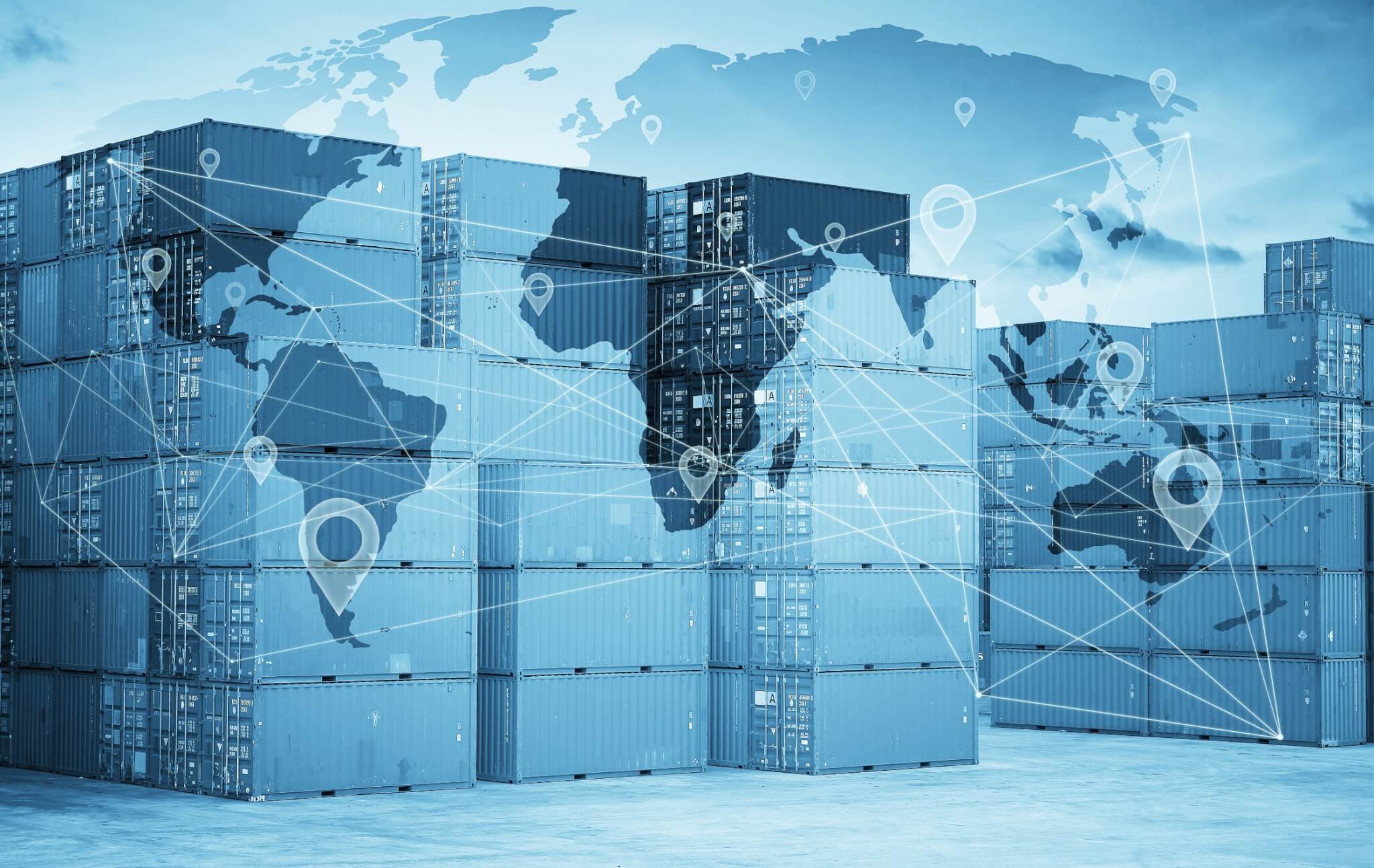 Shipping containers with a world map overlay illustrating global supply chain issues